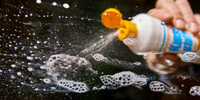 antistatic cleaner on clear acrylic